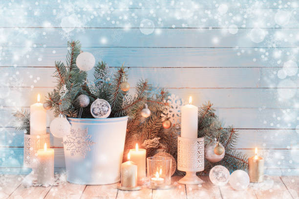 istock white Christmas decorations on blue wooden background 1189535921