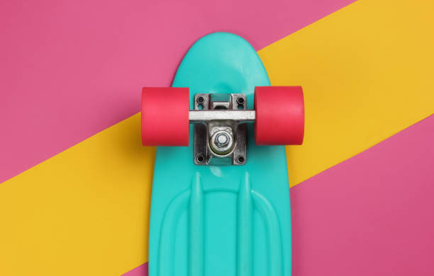 istock Cruiser board on colored paper background. Summer fun. Studio shot. Top view 1189536908