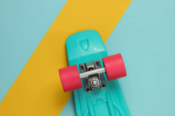 istock Cruiser board on colored paper background. Summer fun. Top view 1189536930
