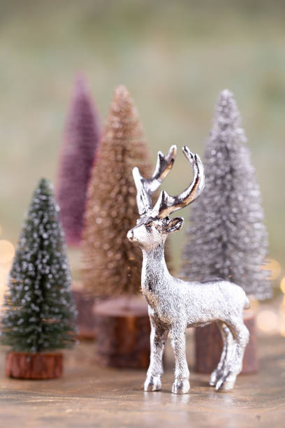 istock Colorful Christmas tree on green, bokeh background. 1189539563