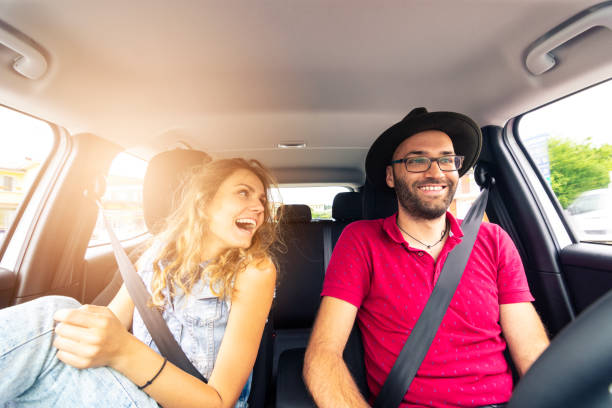 istock Happy Couple in a road trip 1189542362