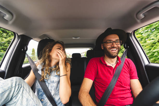 istock Happy Couple in a road trip 1189542363