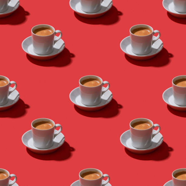 istock Espresso on red background seamless pattern stock photo 1189545435