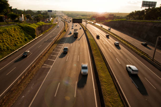 highway urban traffic highway seen over the golden hour overpass road stock pictures, royalty-free photos & images