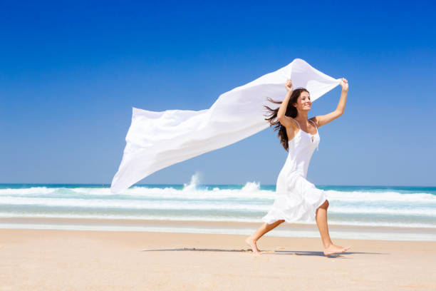istock Jumping with a white scarf 1189547753