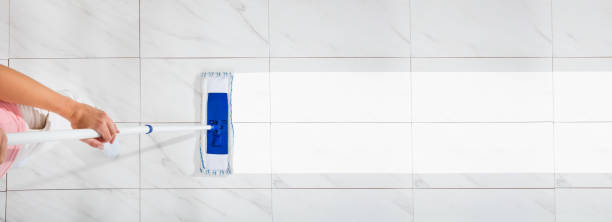 istock Woman Mopping The Floor 1189550240