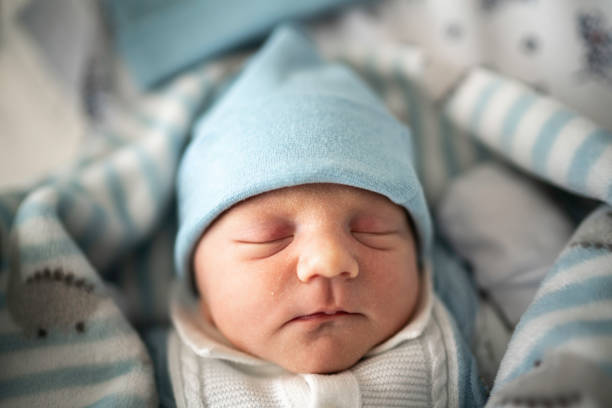 istock Newborn sleeping at hospital 1189551708