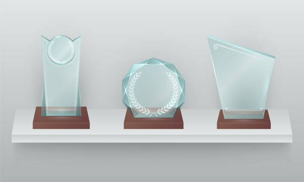 три хрустальные награды на полке реалистичная иллюстрация - award trophy glass crystal stock illustrations