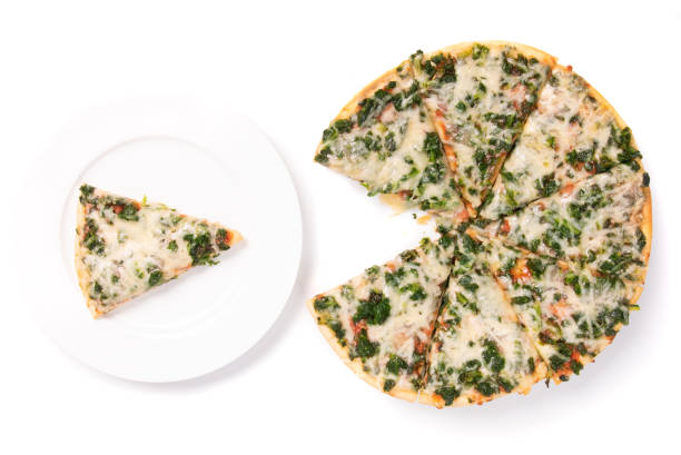 istock sliced spinach vegetarian pizza isolated on white, one piece on a plate top view 1189552745