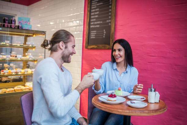 istock Couple enjoying their weekend morning in cafeteria together 1189555033