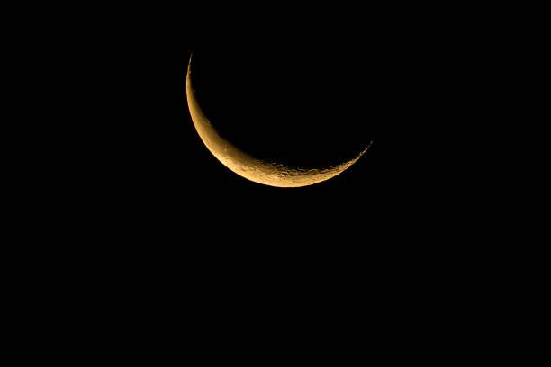 Waning crescent moon rising in the early dawn. Oregon, Ashland, Cascade Siskiyou National Monument, Fall