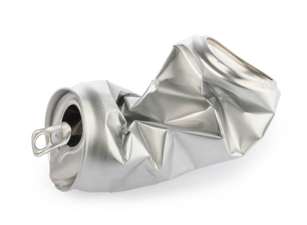 istock Crumpled empty blank soda or beer can garbage. Crushed junk can recycle isolated clipping path 1189557597