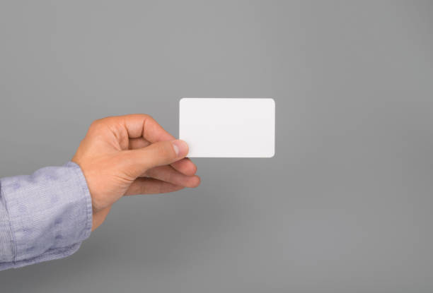 istock hand holds white business card 1189557792