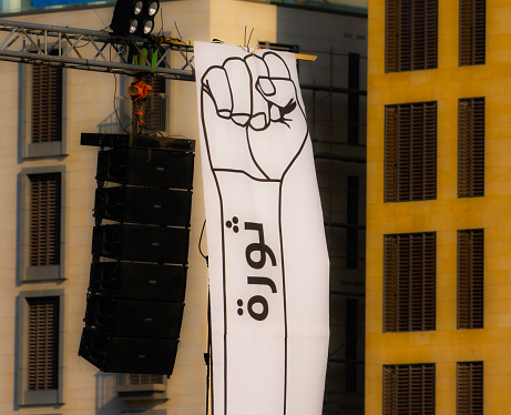 Beirut Lebanon 11/23/2019 A hand with a fist and the word revolution in Arabic became the symbol of the Lebanon demonstration movement