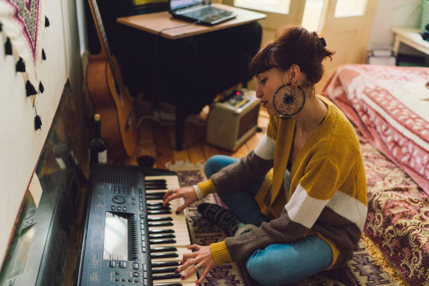 istock Woman composing music 1189560885