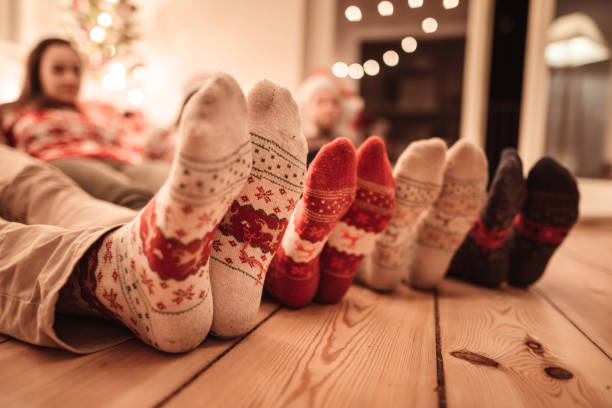 istock friends lying down at home for christmas 1189562399