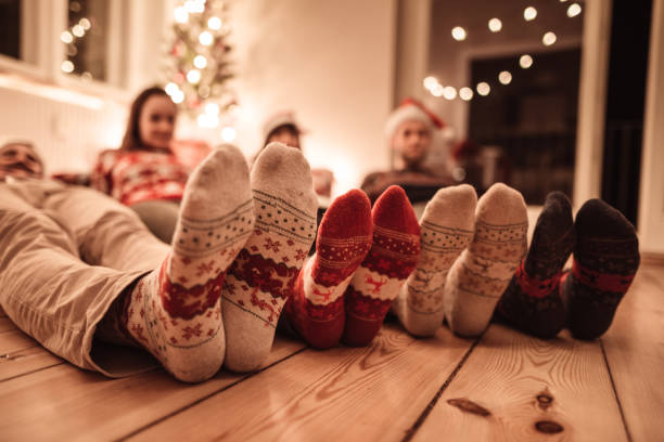 istock friends lying down at home for christmas 1189562767