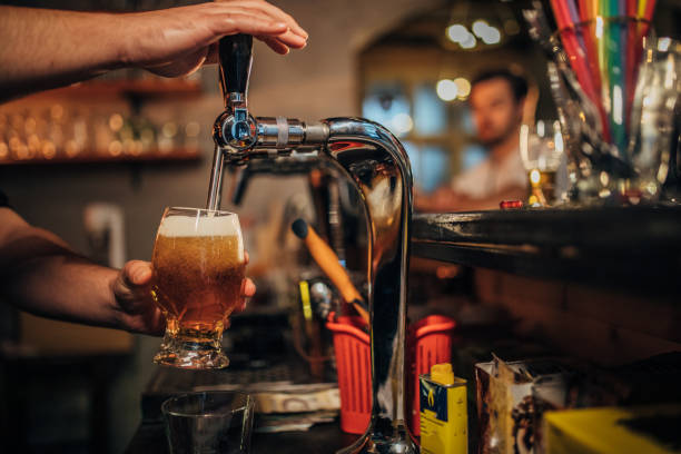 istock Glass of beer with barrel 1189562841
