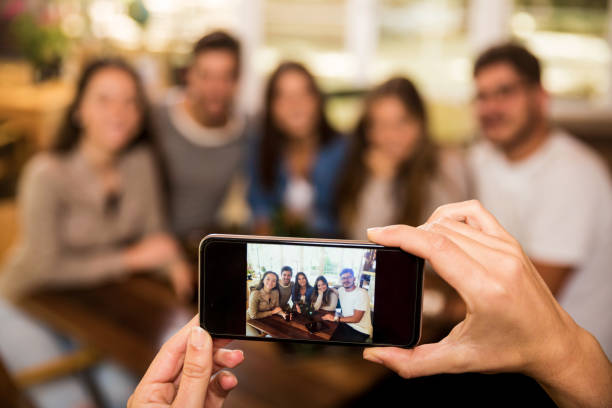 istock Friends taking photos 1189564186