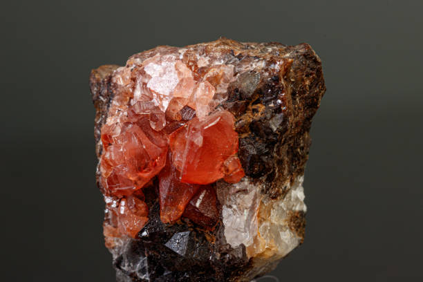 istock macro mineral stone Rhodochrosite on a black background 1189567642