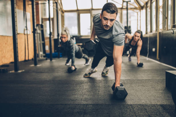 istock Personal Weight Training In The Gym 1189568301