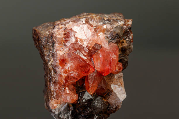 istock macro mineral stone Rhodochrosite on a black background 1189568908