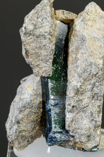 istock macro mineral stone Vivianite on a black background 1189568990