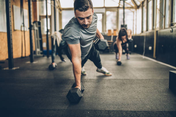 istock Personal Weight Training In The Gym 1189569092