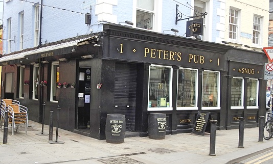 Peter's pub on Johnson Pl, Dublin city centre with Teeling Whiskey barrels outside.