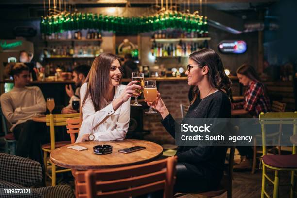 women-friends-drinking-beer.jpg