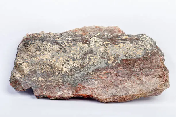 macro mineral bismuth stone on hartenstein schacht on white background close-up