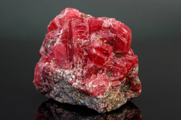 istock macro mineral stone Rhodochrosite on a black background 1189574091