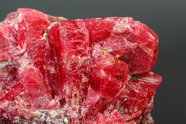 istock macro mineral stone Rhodochrosite on a black background 1189574393