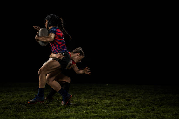 istock Rugby player tackling her opponent 1189578690