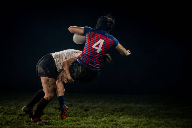 istock Rugby player tackling her opponent 1189578700