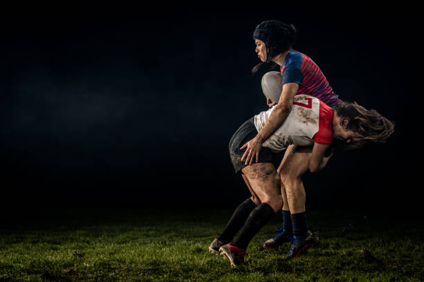 istock Rugby player tackling her opponent 1189578701