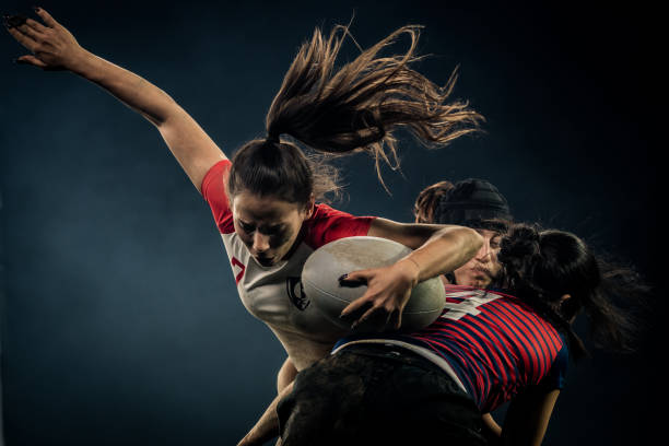 istock Rugby players tackling her opponent 1189578705