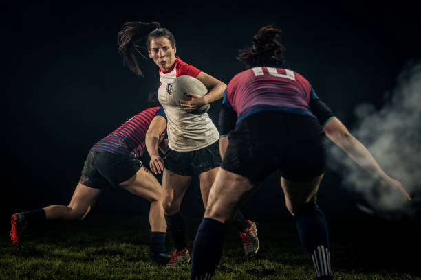 istock Women playing rugby on field 1189578713
