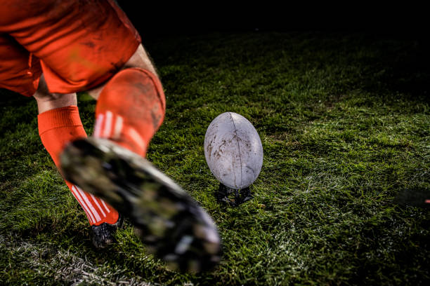 istock Rugby player kicking the ball 1189578718