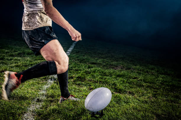 istock Rugby player kicking ball 1189578730