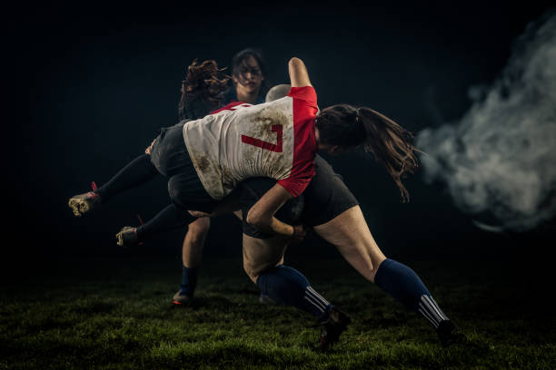 istock Rugby player tackling her opponent 1189578731