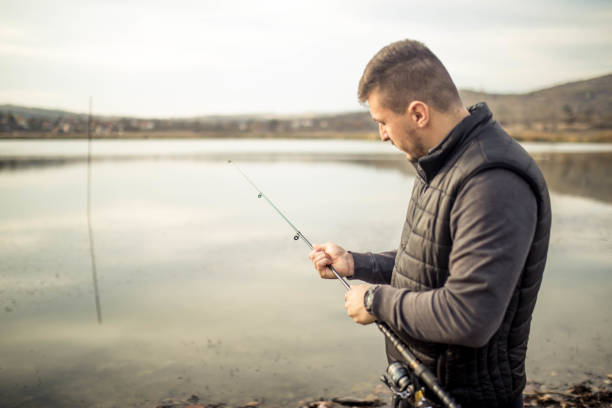 istock Fisherman fishing and enjoying in a weekend 1189579111