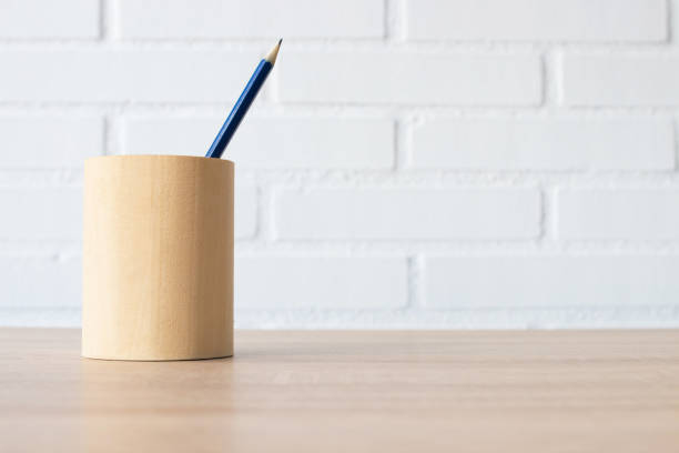istock pencil pen on table or desk 1189580336