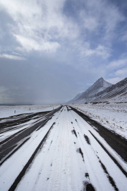 istock country road on a winter day 1189580510