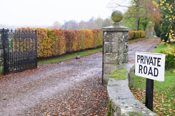 Private road sign at entrance of private estate for mansion house uk Private road sign at entrance of private estate for mansion house military private stock pictures, royalty-free photos & images