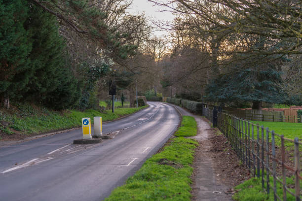 istock Empty road in Aspley Guise, Milton Keynes 1189582391