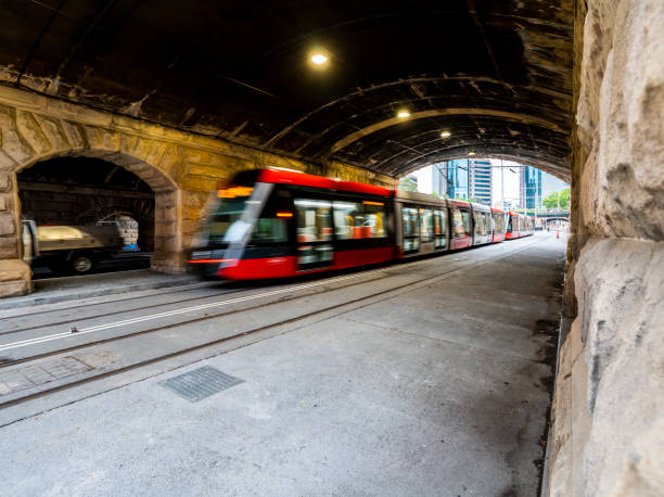 Sydney Light Rail commissioning outside Central railway station, along Eddy Ave. Sydney, Australia - 23 Nov 2019: Sydney Light Rail commissioning outside Central railway station, along Eddy Ave. blurred motion street car green stock pictures, royalty-free photos & images