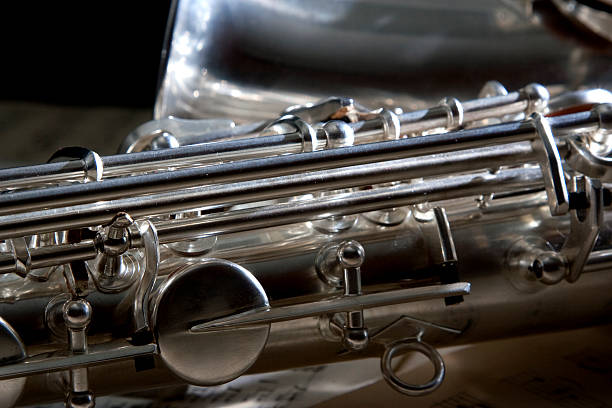 Saxophone and old Sheet music stock photo