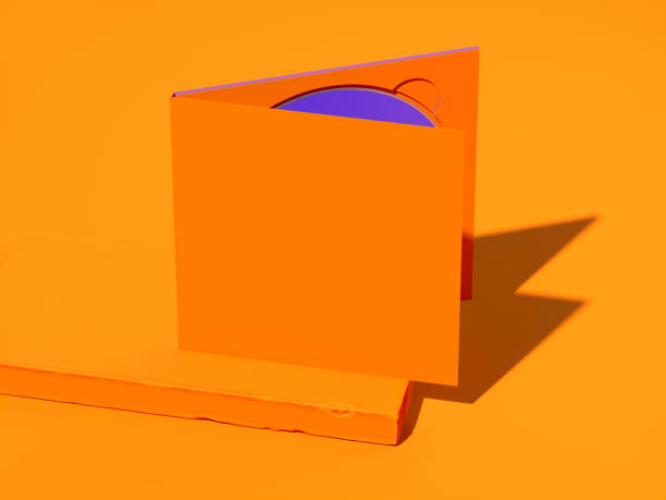 istock Opened compact disc blank box case for branding design. CD on orange showcase. 3d rendering 1189585766