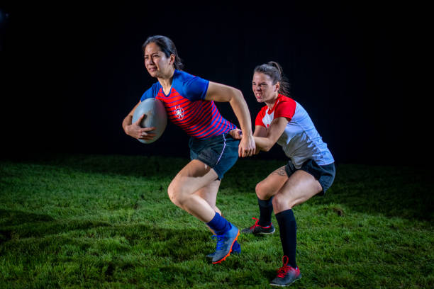 istock Rugby player tackling her opponent 1189585981